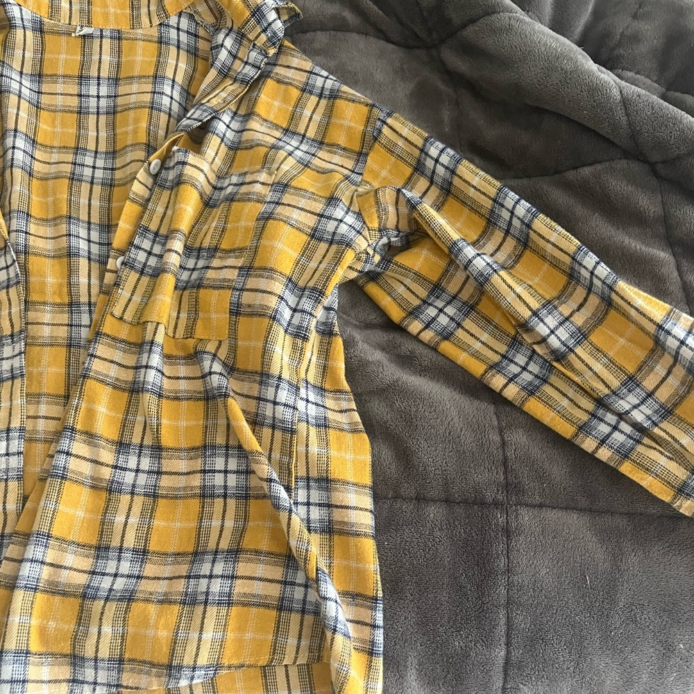 Yellow, blue, and white flannel.